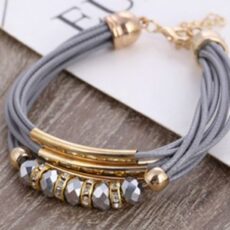 Kuldsete detailidega nahkpaeltest käevõru, hall